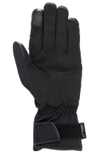 Alpinestars Stella SR-3 V2 Drystar® handschoenen voor dames, zwart, zijaanzicht van de handpalm met synthetisch lederen versterkingen, touchscreen-compatibele wijsvingertop, elastische pols en manchet met verstelbare klittenbandsluiting en Drystar-branding.