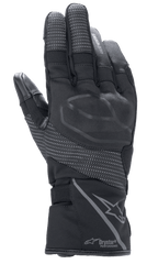 Alpinestars Stella Andes V3 Drystar dames motorhandschoenen, zwart antraciet, aanzicht van de handrug met geïntegreerde knokkelbescherming, reflecterende ripstop-panelen, Alpinestars-logo en Drystar Performance-branding op de manchet, adventure touring motoruitrusting