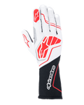 Gants Alpinestars Tech-1 ZX V4, gants de course automobile, blanc et noir avec détails rouges, tissu alvéolé texturé avec coutures extérieures, grand logo rouge sur le dos de la main, poignet long noir avec inscription Alpinestars blanche