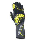 Gants Alpinestars Tech-1 ZX V4, gants de course automobile, gris goudron, noir et jaune fluo, dotés d'un grand logo étoile jaune au dos et d'un marquage blanc sur la manchette, tissu à structure alvéolée avec des accents néon angulaires, équipement professionnel de sport automobile.