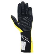 Gants Alpinestars Tech-1 Start V4 FIA, gants de course automobile, jaune fluo et noir, vue de la paume avec motifs d'adhérence en silicone, manchette allongée avec logo blanc et étiquette de certification FIA