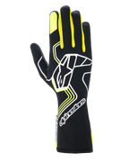 Gants Alpinestars Tech-1 Race V4, gants de course automobile, noirs avec accents jaune fluo et blancs, dotés d'un grand logo étoile sur le dos et d'une plus petite étoile sur l'index, design épuré avec motifs géométriques et manchette longue
