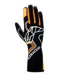 Gants Alpinestars Tech-1 Race V4, gants de course automobile, noir et orange fluo, avec un grand logo Astar blanc sur le dessus de la main, des détails orange sur les doigts et une manchette longue pour une protection professionnelle en sport automobile