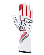 Gants Alpinestars Tech-1 Race V4, gants de course automobile, blancs et rouges avec des accents noirs, avec un logo Alpinestars noir sur le dos de la main, emblème d'étoile rouge sur l'index, conception professionnelle à manchette longue