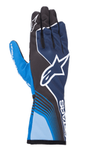Gants Alpinestars Tech-1 K Race V2 Future, gants de karting, bleu marine et bleu clair avec accents noirs, dotés d'un grand logo étoile blanc, de lignes courbes dynamiques, de sections en mesh sur les doigts et d'un design motorsport sportif avec marquage blanc