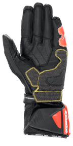 Alpinestars GP Tech V2 Handschuhe, Schwarz, Weiß und Fluorot, Handflächenansicht mit schwarzer Lederkonstruktion und gelben Kontrastnähten, schützende DFS-Manschette mit roten Akzenten, professionelle Racing-Motorradausrüstung