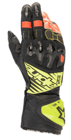 Alpinestars GP Tech V2 handschoenen, motorracehandschoenen, zwart met fluogeel en rode accenten, voorzien van harde knokkelbescherming, geperforeerde leren manchet met DFS-branding en accordeon stretchpanelen voor optimale flexibiliteit.
