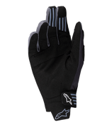 Alpinestars 2025 Techstar Gloves, gants de motocross, noir, vue de la paume montrant le matériau en daim synthétique avec détails perforés, grip en silicone sur le bout des doigts et logo Alpinestars blanc sur la fermeture du poignet.
