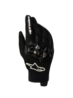 Gants Megawatt V2 Air d'Alpinestars, gants de moto enduro, noirs et blancs, avec protection des articulations et construction en mesh respirant, vue de face