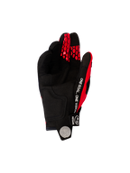 Gants Alpinestars 2026 Pro-Dura, gants de motocross et d'enduro, rouge vif et noir, vue de la paume en suède synthétique noir, texte blanc 'ONE GOAL. ONE VISION' sur le côté, et motifs rouges en nid d'abeille sur le bout des doigts.