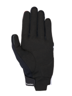 Alpinestars MM93 Reef V2 Handschuhe, Handflächenansicht, Schwarz mit leuchtend roten und weißen Akzenten, verfügt über eine Handfläche aus synthetischem Wildleder, gepolsterte Verstärkungen und einen Klettverschluss am Handgelenk mit Alpinestars-Branding, moderne urbane Motorradausrüstung