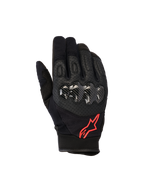 Alpinestars Megawatt V2 handschoenen, motorcrosshandschoenen, zwart en fluorood, voorzien van harde knokkelbescherming met carbon-textuur, geperforeerd leer voor ventilatie en een rood sterlogo, duurzame off-road uitrusting