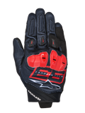 Gants MM93 Spx 1, gants de moto racing, noirs avec des accents rouge vif et blancs, protections de jointures rouges, arborant le logo Marc Marquez 93 et la marque Alpinestars, tissu texturé au design sportif performant