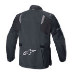 Alpinestars ST-7 2L GORE-TEX jas, achteraanzicht, zwart en donkergrijs, met reflecterende schouderpanelen, zilveren Alpinestars sterlogo op de onderrug en verstelbare taillebanden, adventure touring motorkleding