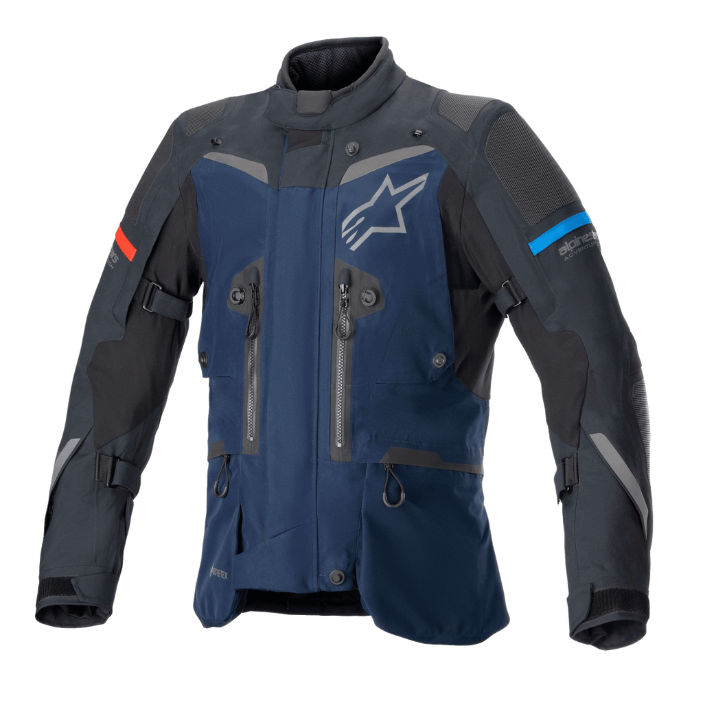 Veste Alpinestars Boulder GORE-TEX, veste de touring aventure bleu foncé et noire, construction textile imperméable, logo étoile blanc sur la poitrine, accents rouges et bleu clair sur les manches, multiples fermetures éclair de ventilation et sangles de réglage, équipement technique durable pour rouler par tous les temps