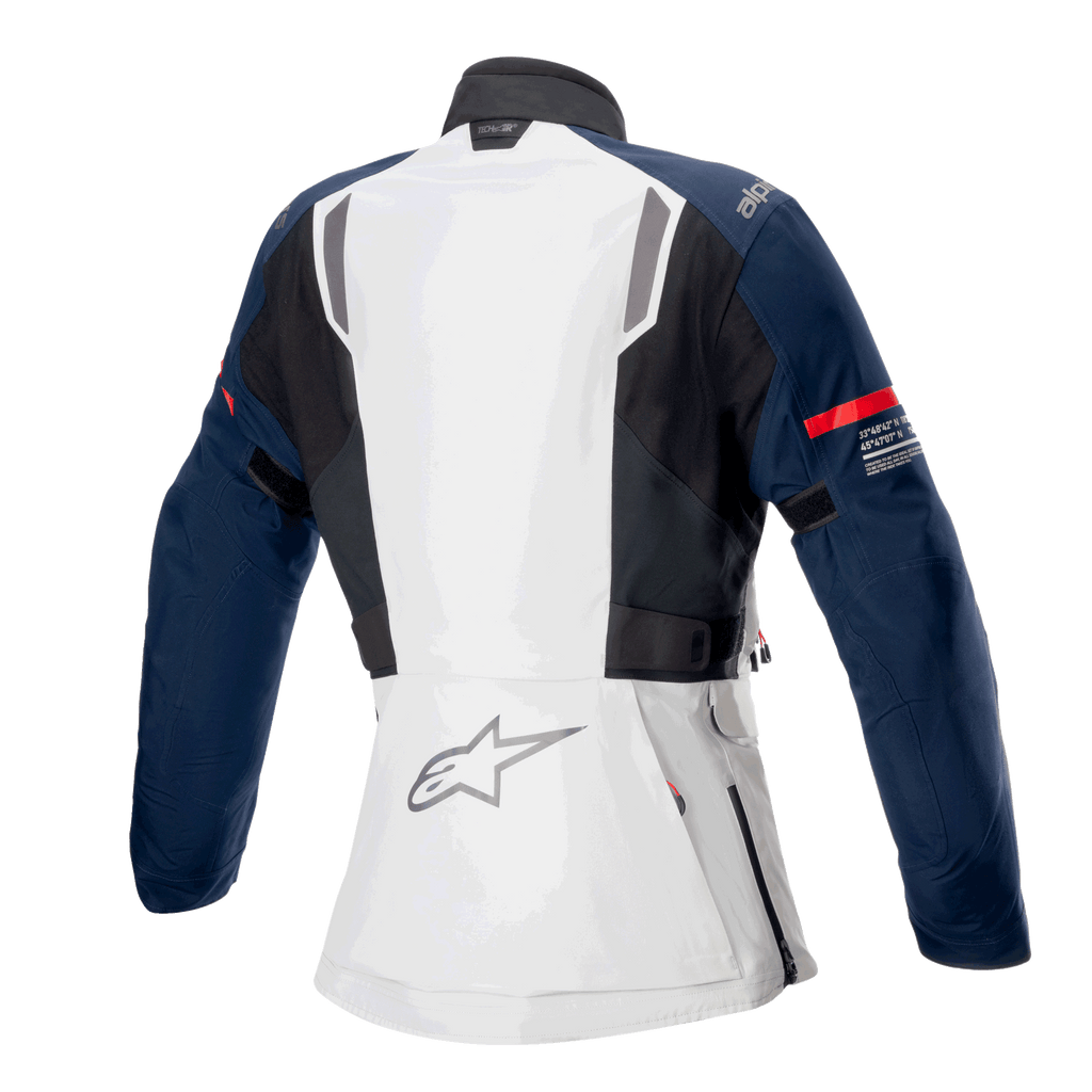 Alpinestars Stella ST-7 2L GORE-TEX damesjas, achteraanzicht, Ice Gray, donkerblauw en zwart, voorzien van rode streep op de mouw en Alpinestars-logo, adventure touring motorkleding