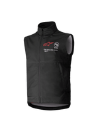 Gilet Softshell Alpinestars Youth Techstar, noir, gilet de motocross sans manches avec logo étoile rouge, col haut, fermeture éclair frontale, inscription "ONE GOAL. ONE VISION.", doublure intérieure gris clair, équipement de sport mécanique pour jeunes