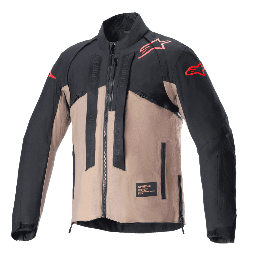 Veste Alpinestars Techdura, veste de moto tout-terrain, noir et brun Falcon, design bicolore avec logos étoiles rouges sur les épaules et les manches, sangles verticales marquées Alpinestars sur la poitrine, matériau textile durable