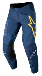 Alpinestars Techstar Phantom Hose, Motocross-Hose, Dunkelblau mit gelben und weißen Akzenten, schwarze Knieeinsätze aus Leder, großes gelbes Stern-Logo am Oberschenkel, weißes ASTARS-Branding, strapazierfähiges Stretch-Ripstop-Gewebe für Offroad-Rennsport