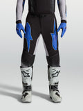 Alpinestars Supertech Hiten AFD, pantalons de motocross pour homme, noirs et bleus, construction en ripstop extensible léger.