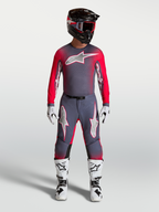 Alpinestars Supertech Hiten AFD Gear Set en broek, professionele motocrossuitrusting voor heren, grijs en fluo rood.