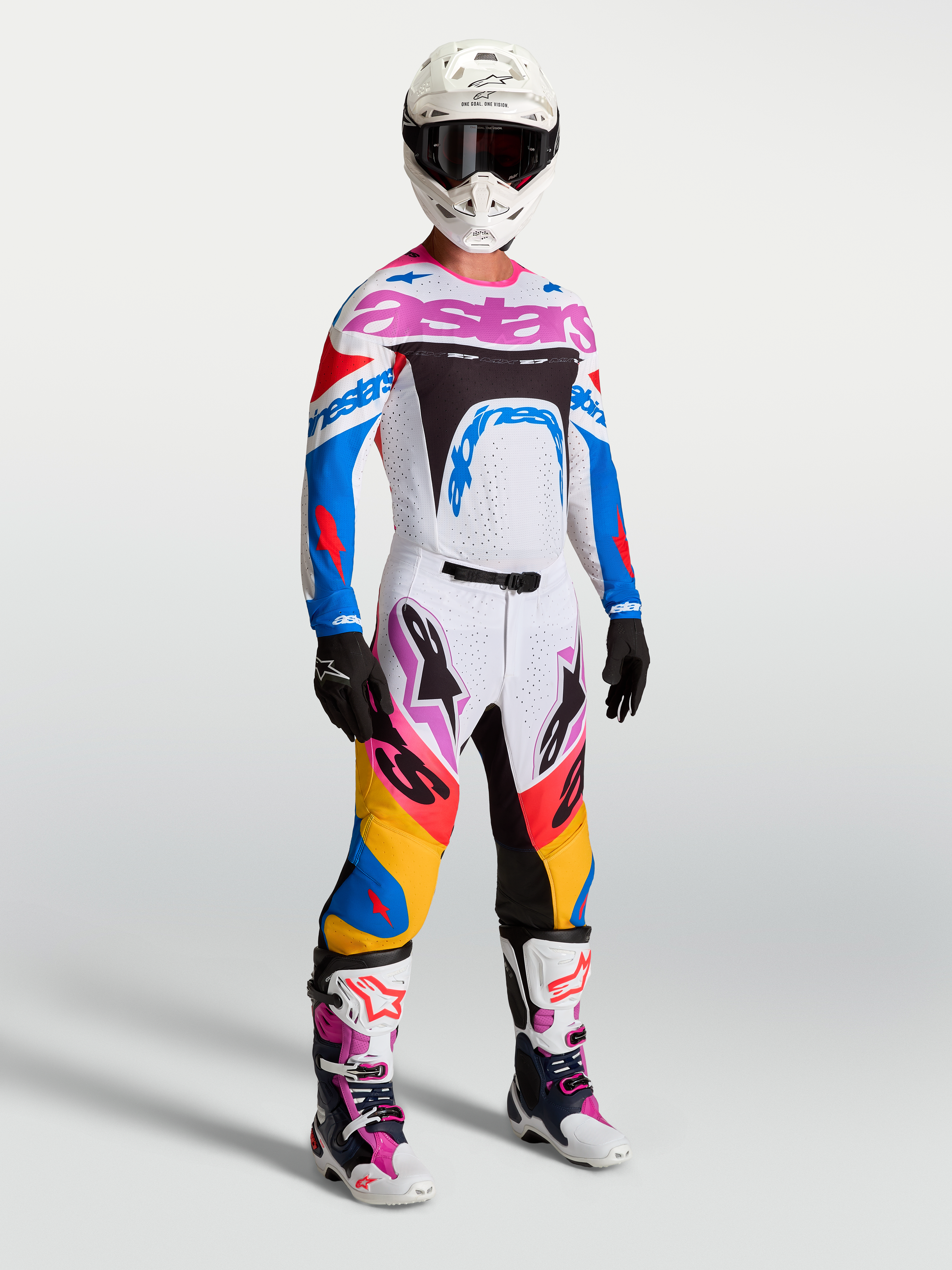 Pantalons Alpinestars Supertech Dyna, équipement de motocross pour homme, blancs et bleus, coupe athlétique extensible.