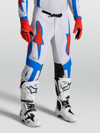 Alpinestars 2027 Supertech Vesta Pants, pro-level motocross gear for racing, Cardinal Red and White with blue accents, stretch rip-stop fabric construction.