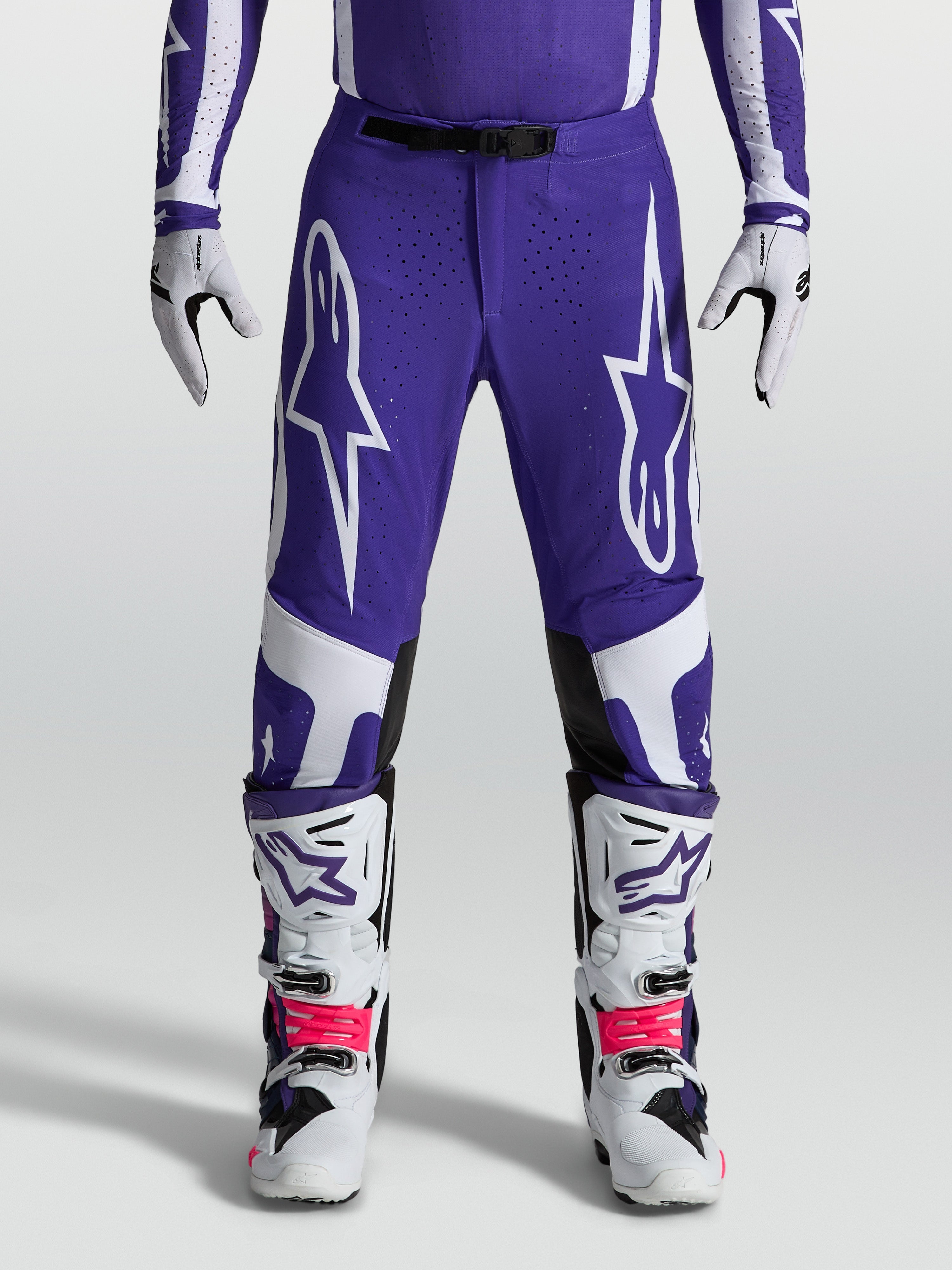 Pantalons Supertech Vesta Alpinestars, pantalon de motocross bleu et blanc, coupe athlétique et construction rip-stop.