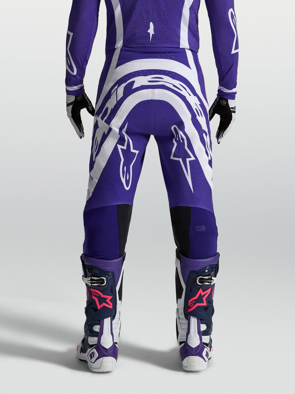 Alpinestars Supertech Vesta motocrossbroek voor heren, diepblauw en wit, achteraanzicht met atletische pasvorm en ripstop-stof.