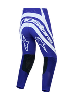 Alpinestars Supertech Vesta broek, herenmotorcrossbroek, diepblauw en wit, achteraanzicht met stergrafieken en leer.