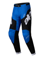 Alpinestars 2025 Racer Veil Pants, motorcross broek, blauw en zwart, met grote witte Alpinestars-branding, zwarte zijpanelen, blauwe kniestukken en een verstelbare gesp aan de taille.