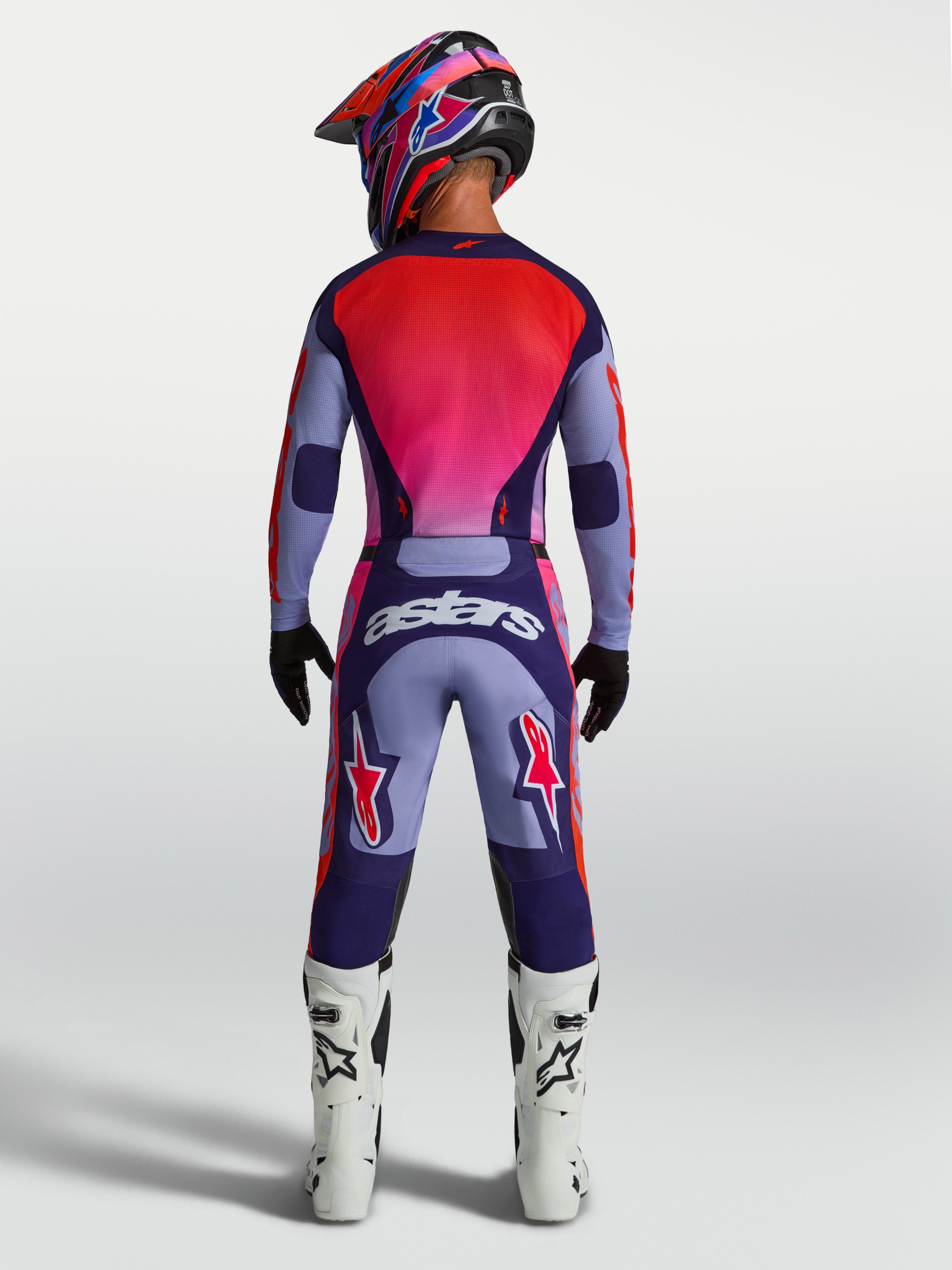 Alpinestars Racer Air Hunt broek, paars en roze motocrossbroek, geventileerd model met Astars-logo op de achterkant.
