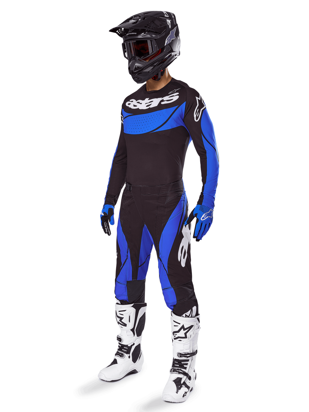 Alpinestars 2025 Techstar Dreem Gear Set, équipement de motocross noir et bleu, incluant un maillot et un pantalon avec logos blancs, porté avec un casque noir, des gants bleus et noirs et des bottes blanches et noires, tenue de course coordonnée pour la performance tout-terrain.