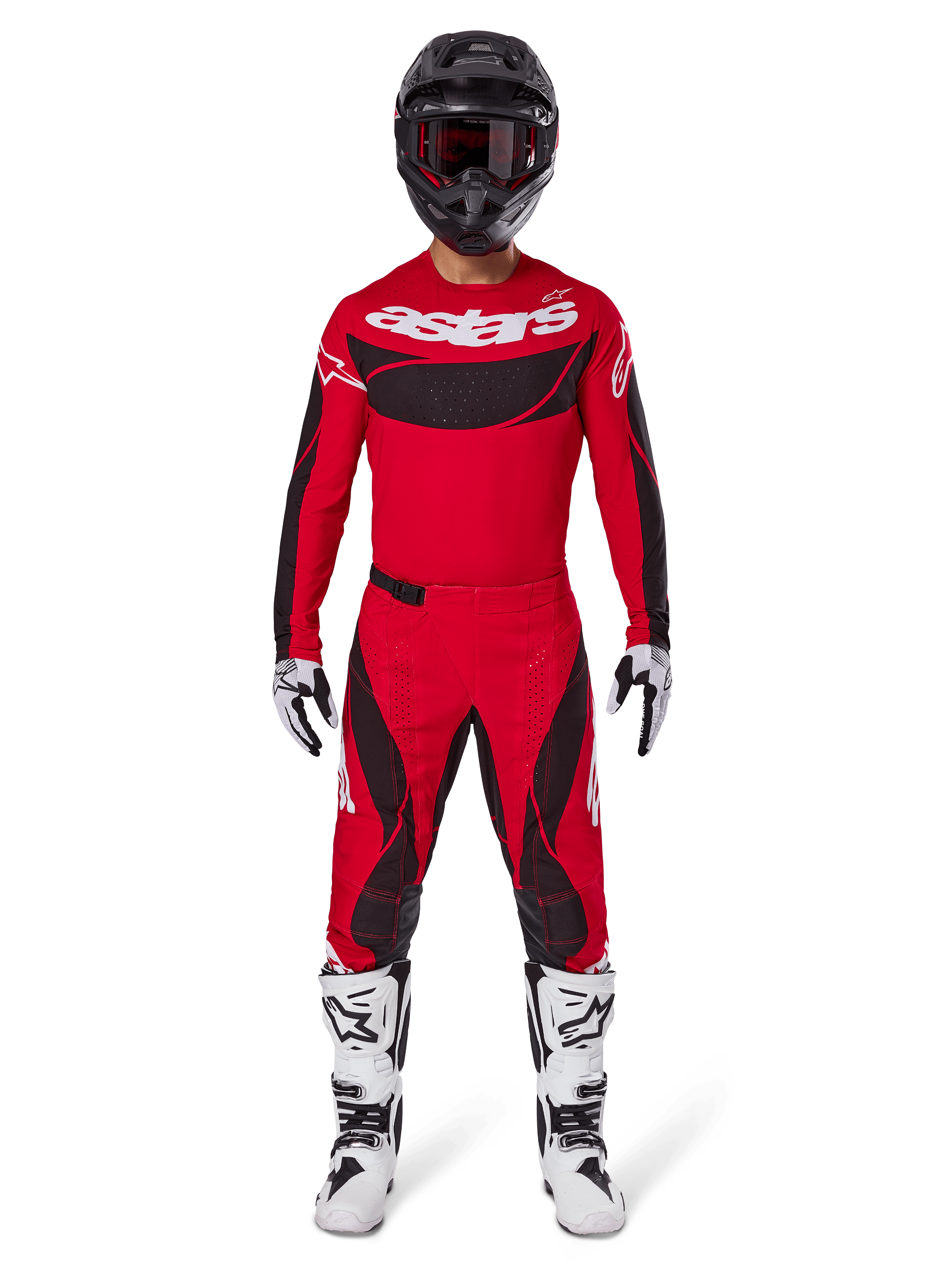 Alpinestars 2025 Techstar Dreem Hose, Motocross-Hose, leuchtendes Rot und Schwarz, getragen als Teil einer kompletten Rennausrüstung mit passendem rotem Trikot, schwarzem Helm und weißen Stiefeln, sportliches Design mit markantem Branding für Offroad-Performance.