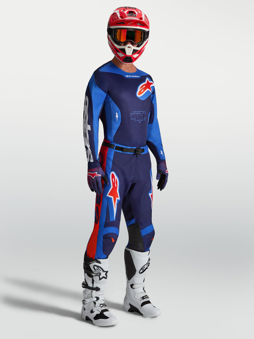 Alpinestars Racer Hunt broek, blauwe en rode motocrossbroek voor heren met een voorgevormde racepasvorm.