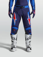 Alpinestars Racer Hunt broek, MX-motocrossbroek voor heren, blauw en rood, voorgevormde constructie met ster-graphics.