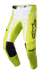 Alpinestars 2023 Techstar Push broek, motorcrossbroek, felgeel en wit met zwarte accenten, voorzien van zwarte lederen knieversterkingen aan de binnenzijde, geperforeerde ventilatiepanelen, groot zwart logo op de dij en een verstelbare gespsluiting in de taille, hoogwaardige off-road uitrusting