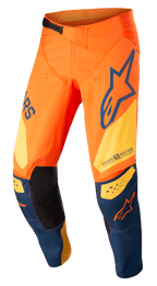 Pantalon Alpinestars Techstar Factory, pantalon de motocross, orange et bleu foncé avec jaune chaud, doté d'un logo audacieux, d'une construction de genou 3D Babel avec empiècements internes en cuir noir et d'un système de fermeture à cliquet réglable à la taille pour la course tout-terrain.
