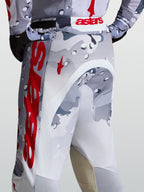 Alpinestars Racer Air Lone Pants for motocross, featuring gray camo and red perforated polyfabric construction.