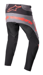Alpinestars 2023 Techstar Sein broek, motorcrossbroek, zwart en neonrood, achteraanzicht met grijs zitvlak en groot neonrood logo, ergonomisch voorgevormde pijpen en duurzame textielconstructie voor off-road prestaties