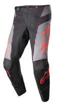 Alpinestars 2023 Techstar Sein broek, motorcross crossbroek, zwart en grijs met neonrode ster-graphics, geperforeerde ventilatiezones, magnetische taillegesp en versterkte 3D Babel-knieconstructie voor off-road prestaties