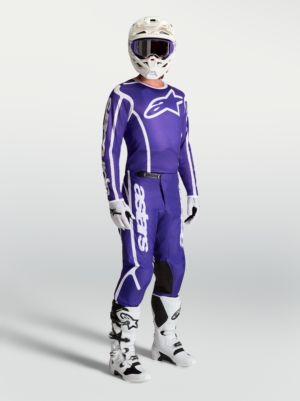 Alpinestars Pantalon Fluid Apex V2, pantalon de motocross bleu et blanc pour homme, coupe 3D ergonomique tout-terrain.