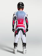 Alpinestars Fluid Drag broek, motorcrossbroek voor heren, zwart, wit en rood fluo, ergonomische 3D-patroonconstructie.