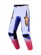 Alpinestars Fluid Drag broek, witte en blauwe motorcrossbroek met roze gespikkelde graphics en geel sterlogo.