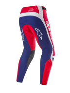 Alpinestars Limited Edition Techstar Fortitude Hose, Motocross-Hose, Hellrot Weiß Blau, Rückansicht mit blauen Gesäß- und Beinpartien, roten und weißen Akzenten, weißen Stern-Logos auf den Oberschenkeln und Techstar Race-Spec-Branding am Bund.