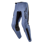 Alpinestars 2024 Fluid Lurv Pants, pantalon de motocross, bleu clair et noir, avec un grand logo Alpinestars noir sur la cuisse, des panneaux intérieurs renforcés aux genoux et une conception ergonomique pré-courbée pour la conduite tout-terrain