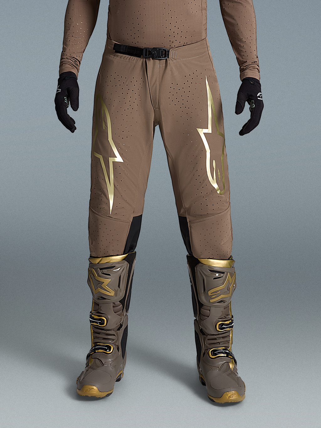 Alpinestars Limited Edition Supertech Air Gold Pants, Men's Brown and Gold Motocross Gear with ventilated rip-stop fabric.