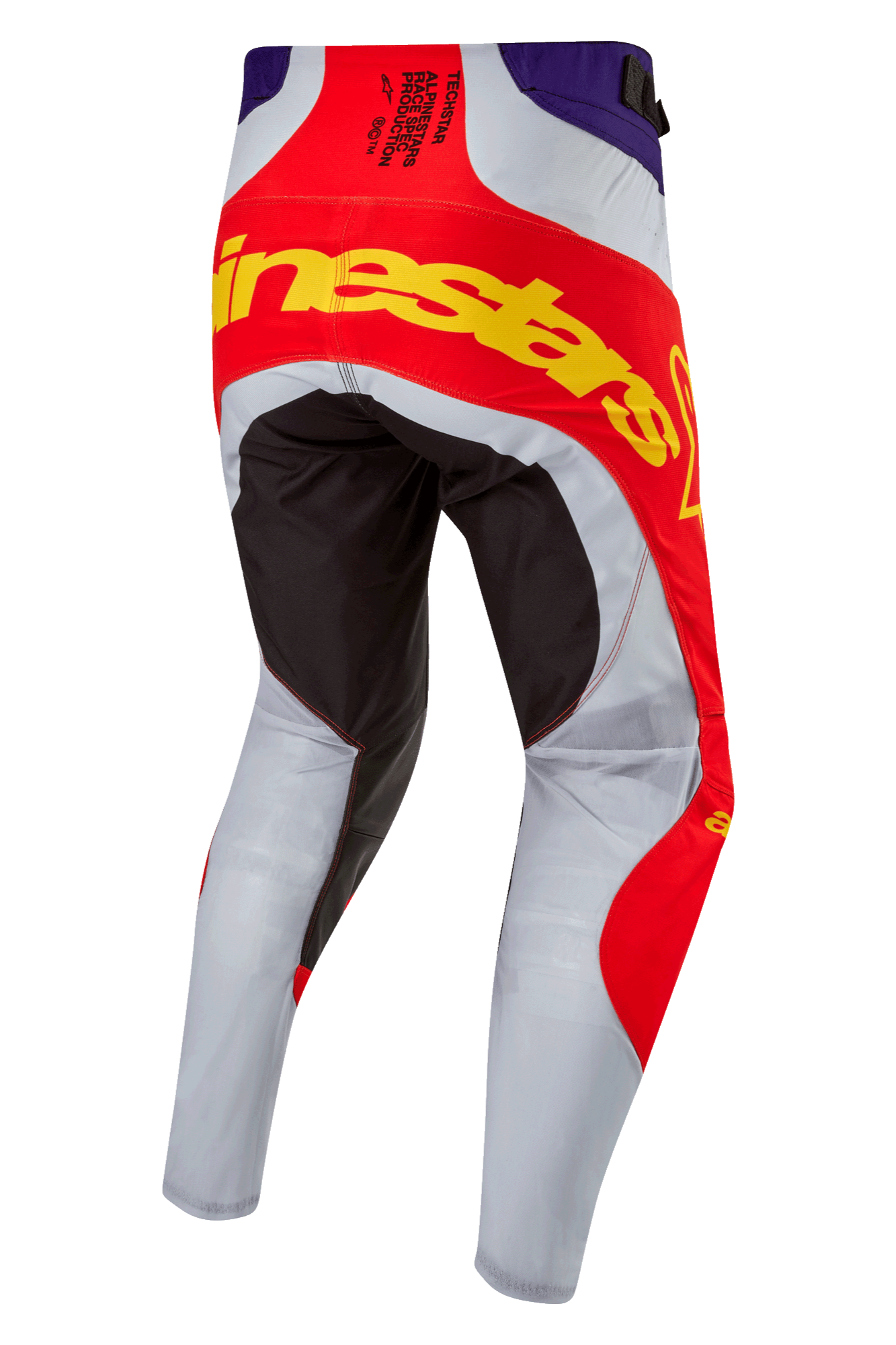 Alpinestars 2024 Techstar Ocuri broek, motorcross broek, fel oranje, paars en zwart, achteraanzicht met opvallende gele merknaam over het zitvlak, zwarte versterkte panelen en lichtgrijze geventileerde pijpen