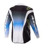 Alpinestars Kinder 2023 Racer Push Trikot, Motocross-Trikot, Nightlife UCLA Blau, Weiß und Schwarz, Rückansicht mit einem blau-weißen Farbverlauf in der Mitte, neongrünen Logos und weißen Seitenakzenten, langärmelige Offroad-Fahrbekleidung