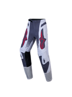 Alpinestars Jeugd Supertech Swan motocrossbroek, grijs en wit met rode sterlogo's, atletische stretch-ripstop.